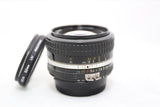 Nikon Nikkor 50mm F/1.4 AIS Lens w Filter & Rear lens cap - GOOD