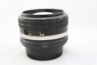 Nikon Nikkor 50mm F/1.4 AIS Lens w Filter & Rear lens cap - GOOD
