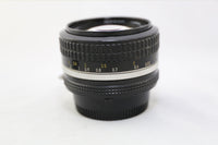Nikon Nikkor 50mm F/1.4 AIS Lens w Filter & Rear lens cap - GOOD