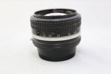 Nikon Nikkor 50mm F/1.4 AIS Lens w Filter & Rear lens cap - GOOD