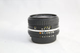 Nikon Nikkor AI-S 28mm f2.8 Series E Lens AIS BOTH lens caps