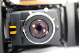 Konica Instant Press Film Camera w/ Hexanon 110mm f4 Lens w 107 B&W Film - EXC