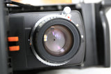 Konica Instant Press Film Camera w/ Hexanon 110mm f4 Lens w 107 B&W Film - EXC