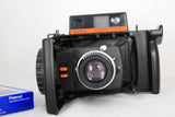 Konica Instant Press Film Camera w/ Hexanon 110mm f4 Lens w 107 B&W Film - EXC